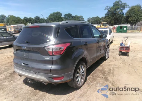 2017 Ford Escape Titanium z USA, uszkodzony, nr VIN 1FMCU0J97HUC80417